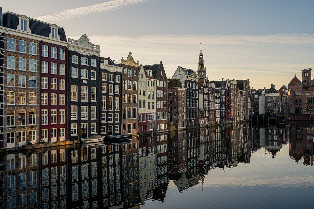 Flights to Amsterdam (AMS) - Amsterdam canals - book airline tickets