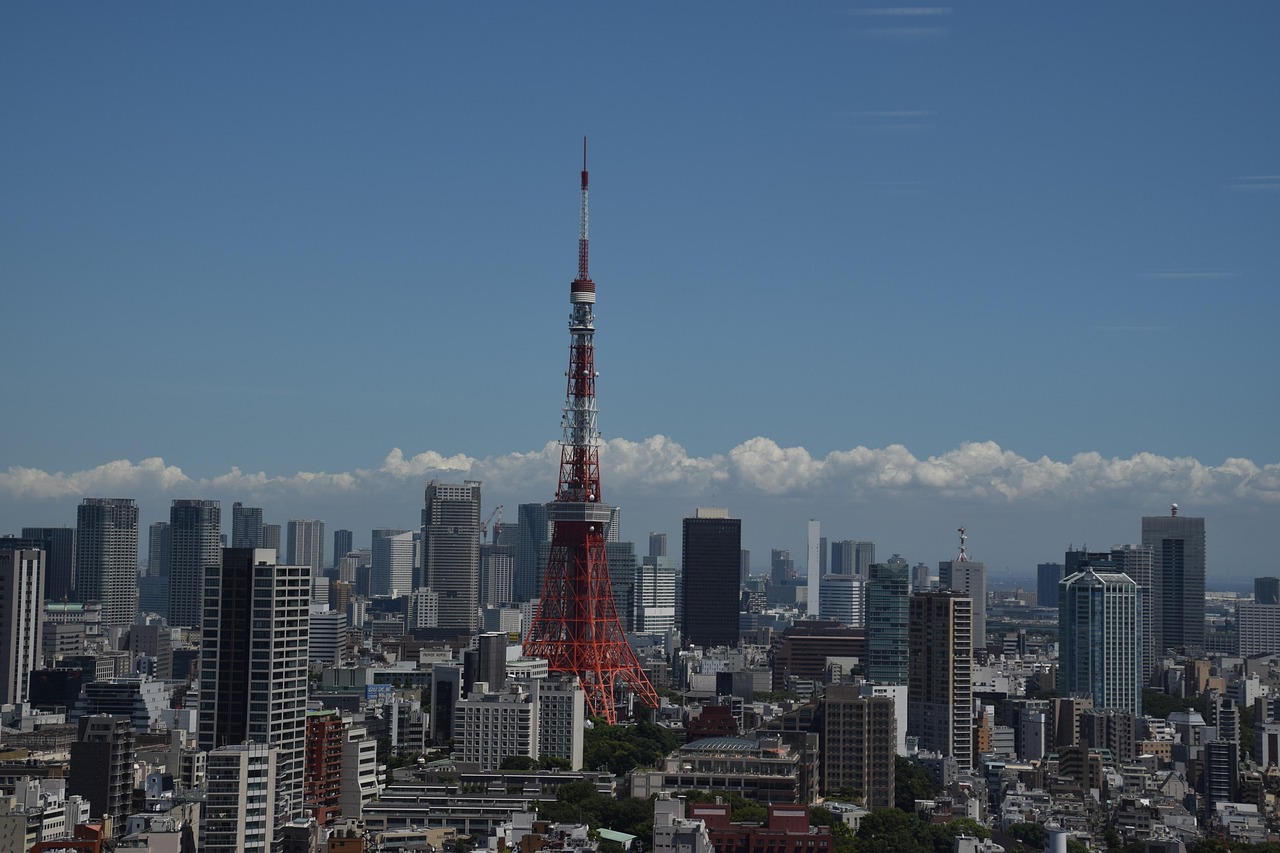 Flights to Tokyo (HND) - Tokyo Tower and skyline - book airline tickets